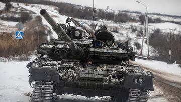 A Ukrainian serviceman drives a tank along a road outside the frontline town of Bakhmut, amid Russia's attack on Ukraine, in Donetsk region, Ukraine February 14, 2023. REUTERS/Yevhenii Zavhorodnii