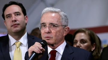 FILE PHOTO: Colombia's former president, Alvaro Uribe, reacts during a news conference after a private hearing at Supreme Court of Justice, in Bogota, Colombia October 8, 2019. REUTERS/Luisa Gonzalez/File Photo