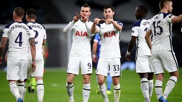 LONDON, ENGLAND - FEBRUARY 24: Gareth Bale of Tottenham Hotspur celebrates with team mate Ben Davies after scoring their side's third goal during the UEFA Europa League Round of 32 match between Tottenham Hotspur and Wolfsberger AC at The Tottenham H