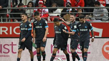 Marseille's Chilean forward Alexis Sanchez (3rdL) celebrates scoring his team's second goal with teammates during the French L1 football match between Stade de Reims and Olympique Marseille (OM) at Stade Auguste-Delaune in Reims, northern France on March 19, 2023. (Photo by FRANCOIS LO PRESTI / AFP)