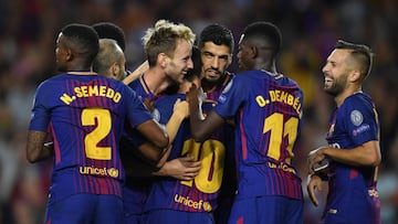 Ivan Rakitic of Barcelona celebrates scoring his sides second goal with his Barcelona team mates during the UEFA Champions League Group D match between FC Barcelona and Juventus at Camp Nou