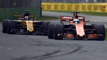 Alonso con el McLaren y Hulkenberg con el Renault.