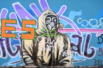 A piece of street art grafitti is pictured in East London on April 19, 2020, during the novel coronavirus COVID-19 pandemic. - The number of people in Britain who have died in hospital from coronavirus has risen by 596 to 16,060 according to daily health