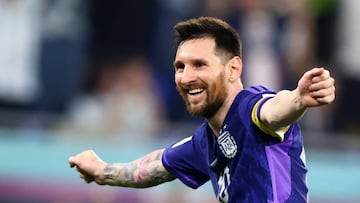 DOHA, QATAR - NOVEMBER 30: Lionel Messi of Argentina 
celebrates as Julian Alvarez of Argentina  scores the goal during the FIFA World Cup Qatar 2022 Group C match between Poland and Argentina at Stadium 974 on November 30, 2022 in Doha, Qatar. (Photo by Stefan Matzke - sampics/Corbis via Getty Images)