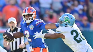 Florida Gators celebrate their first bowl game victory since 2019, defeating Tulane in the Gasparilla Bowl with a dominant performance on both offense and defense.