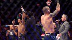 LAS VEGAS, NEVADA - DECEMBER 10: (L-R) Raul Rosas Jr. reacts after defeating Jay Perrin in a featherweight fight during the UFC 282 event at T-Mobile Arena on December 10, 2022 in Las Vegas, Nevada.   Sean M. Haffey/Getty Images/AFP (Photo by Sean M. Haffey / GETTY IMAGES NORTH AMERICA / Getty Images via AFP)