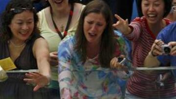 Phelps con su hermana Hillary