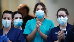 Spanish health workers return the daily 8pm applause in Madrid. 
 