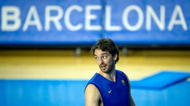 (FILES) In this file photo taken on October 06, 2011 NBA basketball player Spanish Pau Gasol trains with the Regal Barcelona team at the Palau Blaugrana in Barcelona. - The Spanish pivot Pau Gasol will return twenty years later to Barcelona with whom he h