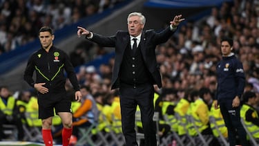 Real Madrid's Italian coach Carlo Ancelotti gestures during the Spanish league football match between Real Madrid CF and Valencia CF at the Santiago Bernabeu stadium in Madrid on April 5, 2025. (Photo by JAVIER SORIANO / AFP)