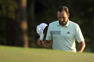 Sergio Garcia of Spain tips his cap as he walks to the 18th green during the second round of the 2018 Masters Tournament