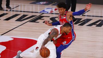 Aug 9, 2020; Lake Buena Vista, Florida, USA;  Damian Lillard #0 of the Portland Trail Blazers drives against Matisse Thybulle #22 of the Philadelphia 76ers during the fourth quarter at Visa Athletic Center at ESPN Wide World Of Sports Complex on August 09, 2020 in Lake Buena Vista, Florida.  Mandatory Credit: Kevin C. Cox/Pool Photo-USA TODAY Sports