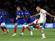 Italy's defender #03 Federico Dimarco kicks the ball and scores during the UEFA Nations League Group A2 football match between France and Italy at the Parc des Princes in Paris on September 6, 2024. (Photo by Franck FIFE / AFP)