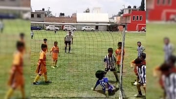 This video footage of a young goalkeeper preventing the opposition scoring on four consecutive attempts has gone viral, along with his celebration.