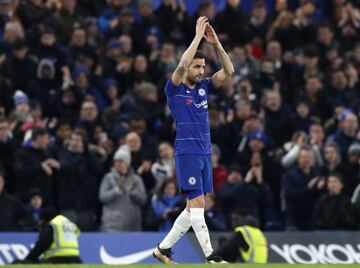 Chelsea's Cesc Fabregas applauds the supporters as he leaves the pitch after being substituted during the English FA Cup third round match between Chelsea and Nottingham Forest at Stamford Bridge on Saturday.