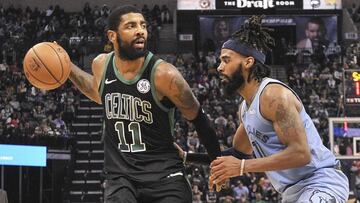Dec 29, 2018; Memphis, TN, USA; Boston Celtics guard Kyrie Irving (11) handles the ball against Memphis Grizzlies guard Mike Conley (11) during the second half at FedExForum. Boston Celtics defeated the Memphis Grizzlies 123-103. Mandatory Credit: Justin Ford-USA TODAY Sports