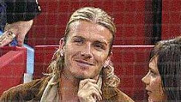 <b>AMOR DE TENIS.</B> Los Beckham, viendo a Ferrero.