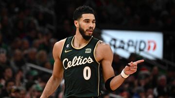 BOSTON, MASSACHUSETTS - DECEMBER 25: Jayson Tatum #0 of the Boston Celtics reacts after scoring a three-point basket against the Milwaukee Bucks during the third quarter at the TD Garden on December 25, 2022 in Boston, Massachusetts. NOTE TO USER: User expressly acknowledges and agrees that, by downloading and or using this photograph, User is consenting to the terms and conditions of the Getty Images License Agreement.   Brian Fluharty/Getty Images/AFP (Photo by Brian Fluharty / GETTY IMAGES NORTH AMERICA / Getty Images via AFP)