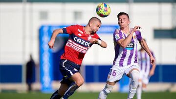 MURCIA, SPAIN - DECEMBER 10: Diego Moreno of Real Valladolid competes for the ball with Edon Zhegrova of Lille during the friendly match between Real Valladolid and Lille at Pinatar Arena on December 10, 2022 in Murcia, Spain. (Photo by Silvestre Szpylma/Quality Sport Images/Getty Images)