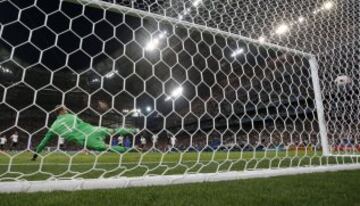 Neuer can only watch as Griezmann's penalty flies into the net.