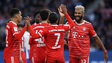 Bayern Munich's Cameroonian forward Eric Maxim Choupo-Moting (R) celebrates scoring his team's third goal (0-3) during the German first division Bundesliga football match between Hertha Berlin and FC Bayern Munich in Berlin on November 5, 2022. (Photo by Ronny HARTMANN / AFP) / DFL REGULATIONS PROHIBIT ANY USE OF PHOTOGRAPHS AS IMAGE SEQUENCES AND/OR QUASI-VIDEO