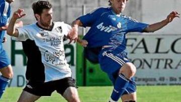 <b>PRESIÓN RIOJANA. </b>Agus lucha por el esférico ante un rival en los últimos minutos.