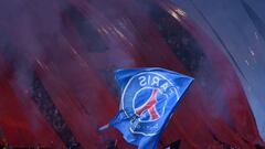 PARIS, FRANCE - APRIL 30: A Paris Saint-Germain giant flag is waved in front of flares during the UEFA Women's Champions League Semi Final Second Leg match between Paris Saint-Germain and Olympique Lyon at Parc des Princes on April 30, 2022 in Paris, France. (Photo by Aurelien Meunier - PSG/PSG via Getty Images)