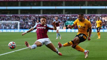 Aston Villa's English defender Matty Cash (L) vies with Wolverhampton Wanderers' Brazilian defender Marcal during the English Premier League football match between Aston Villa and Wolverhampton Wanderers at Villa Park in Birmingham, central Engl