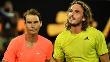 Greece's Stefanos Tsitsipas (R) and Spain's Rafael Nadal watch after their men's singles quarter-final match on day ten of the Australian Open tennis tournament in Melbourne on February 17, 2021. (Photo by Paul CROCK / AFP) / -- IMAGE RESTRICTED TO EDITOR