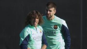 Puyol se retiró del entreno por un golpe en la rodilla