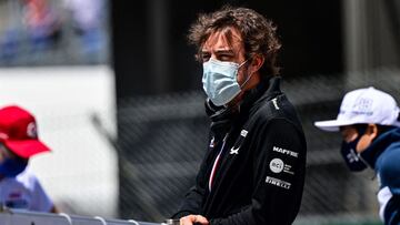 Alpine&#039;s Spanish driver Fernando Alonso looks on ahead of the drivers parade prior to the Monaco Formula 1 Grand Prix at the Monaco street circuit in Monaco, on May 23, 2021. (Photo by ANDREJ ISAKOVIC / AFP)