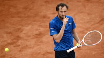 Russia's Daniil Medvedev reacts during the match against Italy's Lorenzo Musetti in their men's singles match at the ATP Rome Open tennis tournament at Foro Italico in Rome on May 13, 2025. (Photo by Marco BERTORELLO / AFP)