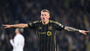 Nov 8, 2024; Los Angeles, California, USA; LAFC midfielder Mateusz Bogusz (19) celebrates after scoring a goal against Vancouver Whitecaps FC in the second half in a 2024 MLS Cup Playoffs Round One match at BMO Stadium. Mandatory Credit: Kelvin Kuo-Imagn Images