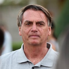 Why has Jair Bolsonaro applied for a US tourist visa? What is he being investigated for in Brazil?