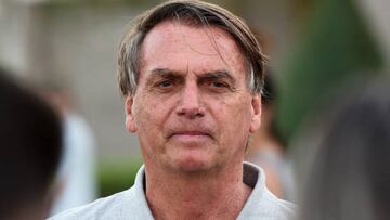 Why has Jair Bolsonaro applied for a US tourist visa? What is he being investigated for in Brazil?