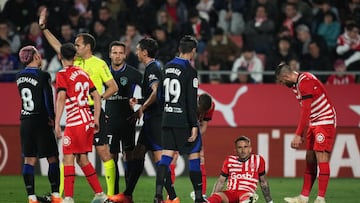 GIRONA, SPAIN - MARCH 13: Aleix Garcia of Girona FC goes down injured during the LaLiga Santander match between Girona FC and Atletico de Madrid at Montilivi Stadium on March 13, 2023 in Girona, Spain. (Photo by Alex Caparros/Getty Images)