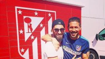 Arda y Simeone, tras un entrenamiento.