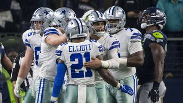 Jan 5, 2019; Arlington, TX, USA; Dallas Cowboys quarterback Dak Prescott (4) and running back Ezekiel Elliott (21) celebrate after a touchdown during the fourth quarter against the Seattle Seahawks in a NFC Wild Card playoff football game at AT&amp;T Stadium. Mandatory Credit: Jerome Miron-USA TODAY Sports