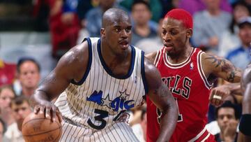 ORLANDO, FL - APRIL 7: Shaquille O'Neal #32 of the Orlando Magic handles the ball against Dennis Rodman #91 of the Chicago Bulls on April 7, 1996 at the Orlando Arena in Orlando, Florida. NOTE TO USER: User expressly acknowledges and agrees that, by downloading and/or using this photograph, user is consenting to the terms and conditions of the Getty Images License Agreement. Mandatory Copyright Notice: Copyright 1996 NBAE (Photo by Barry Gossage/NBAE via Getty Images)