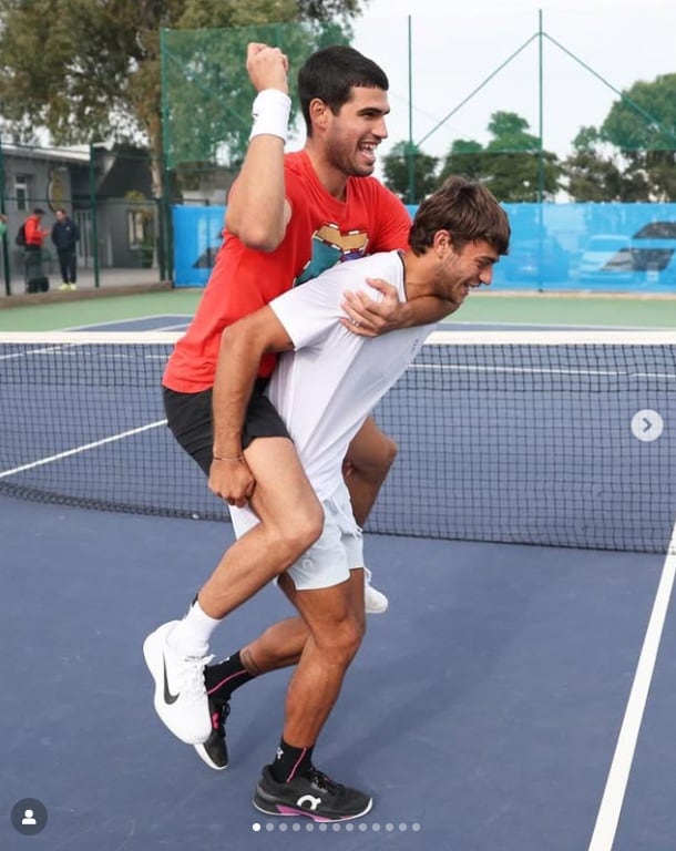 Los tenistas italianos Carlos Alcaraz y Flavio Cobolli, durante un entrenamiento