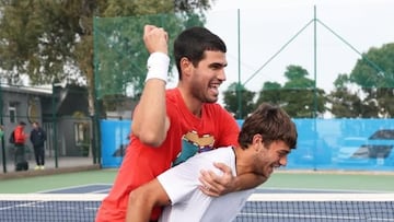 Los tenistas italianos Carlos Alcaraz y Flavio Cobolli, durante un entrenamiento