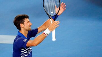 Serbia's Novak Djokovic celebrates his victory against France's Jo-Wilfried Tsonga during their men's singles match on day four of the Australian Open tennis tournament in Melbourne early January 18, 2019. (Photo by DAVID GRAY / AFP) / -- IMAGE RESTRICTED TO EDITORIAL USE - STRICTLY NO COMMERCIAL USE --