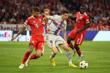 Lucas Hernández y Robert Lewandowski.