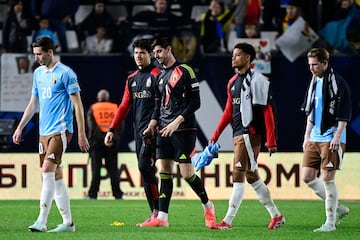 Belgium's goalkeeper #01 Thibaut Courtois (C) reacts as he leaves the pitch with teammates at the end of the UEFA Nations League play-off first leg football match between Ukraine and Belgium at Enrique Roca stadium in Murcia, on March 20, 2025. (Photo by JOSE JORDAN / AFP)