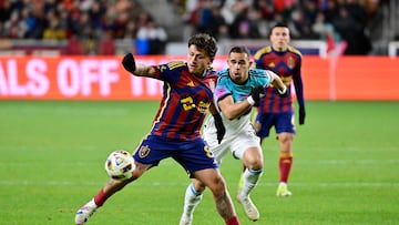 Oct 29, 2024; Sandy, Utah, USA; Real Salt Lake midfielder Diego Luna (8) controls the ball against Minnesota United midfielder Hassani Dotson (31) in the second half in a 2024 MLS Cup Playoffs Round One match at America First Field. Mandatory Credit: Christopher Creveling-Imagn Images