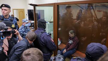 Darya Trepova, who is suspected of the killing of Russian military blogger Maxim Fomin widely known by the name of Vladlen Tatarsky, sits in an enclosure for defendants during a court hearing in Moscow, Russia, April 4, 2023. REUTERS/Evgenia Novozhenina