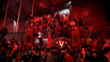 Soccer Football - Premier League - Liverpool fans celebrate winning the Premier League - Liverpool, Britain - June 25, 2020 Liverpool fans celebrate winning the Premier League outside Anfield after Chelsea won their match against Manchester City REUTERS