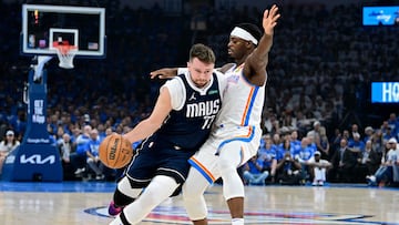 OKLAHOMA CITY, OKLAHOMA - MAY 07: Luka Doncic #77 of the Dallas Mavericks drives to the basket against Luguentz Dort #5 of the Oklahoma City Thunder during the first quarter in Game One of the Western Conference Second Round Playoffs at Paycom Center on May 07, 2024 in Oklahoma City, Oklahoma. NOTE TO USER: User expressly acknowledges and agrees that, by downloading and or using this photograph, User is consenting to the terms and conditions of the Getty Images License Agreement. Joshua Gateley/Getty Images/AFP (Photo by Joshua Gateley / GETTY IMAGES NORTH AMERICA / Getty Images via AFP)