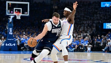 OKLAHOMA CITY, OKLAHOMA - MAY 07: Luka Doncic #77 of the Dallas Mavericks drives to the basket against Luguentz Dort #5 of the Oklahoma City Thunder during the first quarter in Game One of the Western Conference Second Round Playoffs at Paycom Center on May 07, 2024 in Oklahoma City, Oklahoma. NOTE TO USER: User expressly acknowledges and agrees that, by downloading and or using this photograph, User is consenting to the terms and conditions of the Getty Images License Agreement.   Joshua Gateley/Getty Images/AFP (Photo by Joshua Gateley / GETTY IMAGES NORTH AMERICA / Getty Images via AFP)