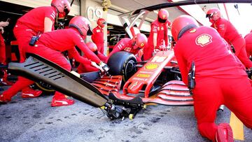 Formula One F1 - Portuguese Grand Prix - Algarve International Circuit, Portimao, Portugal - October 23, 2020  Mechanics work on Ferrari&#039;s Charles Leclerc&#039;s car in the pit lane during practice  FIA/Handout via REUTERS??ATTENTION EDITORS - THIS IMAGE HAS BEEN SUPPLIED BY A THIRD PARTY. NO RESALES. NO ARCHIVES